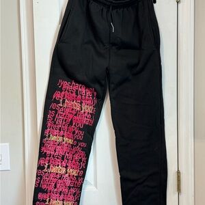Black Joggers with Pink and Yellow Text